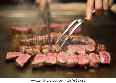 Grilling beef steak (japanese kobe matsusaka) Royalty-Free Stock Photo #157668722