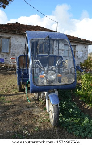 The motorcycle of a villager in its strange form