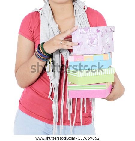 attractive woman with many gifts, isolated on white background