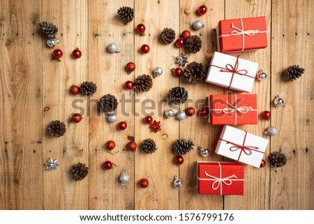 Christmas gift- Pine cones and branches  On the wood-