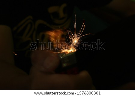 A lighter is a portable device used to create a flame, and to ignite a variety of combustible materials, such as cigars, gas stoves, fireworks, candles or cigarettes.