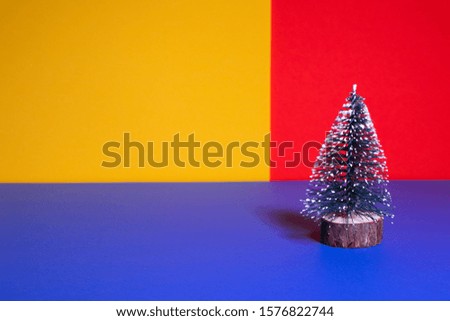 toy christmas tree. Christmas tree on a colored background