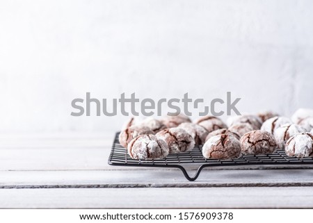 Chocolate crinkle cookies on white background