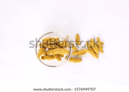 Turmeric on bowl Isolated in white images