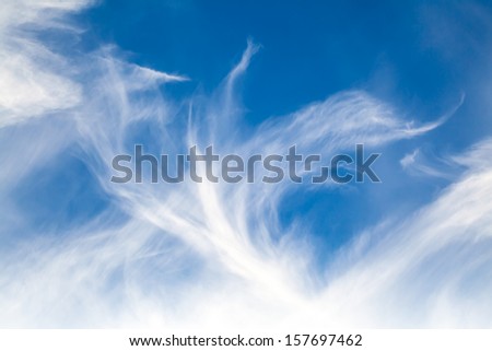 Natural blue windy cloudy sky background photo texture