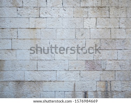 Street texture of painted rectangular stones wall