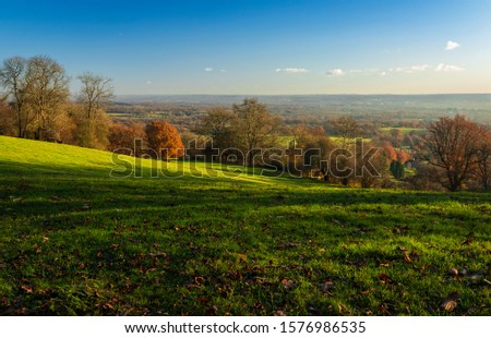Beautiful late autumn views south of the weald from the Kent downs near Sevenoaks south east England UK Royalty-Free Stock Photo #1576986535