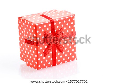 beautiful new year red gift boxes on white background close-up
