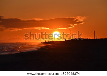 Autumnal sunset in the beach