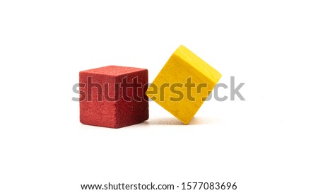 colorful cubes on white background lined up in different shapes