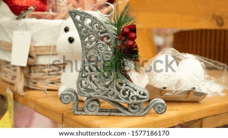 Christmas toy ice skate stands on the table