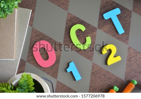 October 12, Appointment with wooden text design for background.