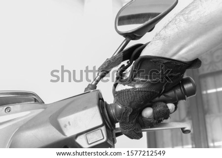 old motorcycle glove tear and no safety hands