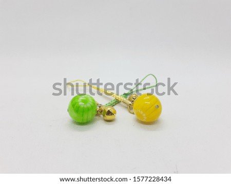 Colorful Beautiful Luxury Cute Elegant Girly Hand Wrist and Earring Bell Accessories in White Isolated Background