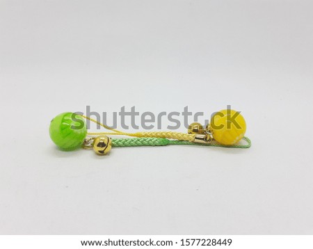 Colorful Beautiful Luxury Cute Elegant Girly Hand Wrist and Earring Bell Accessories in White Isolated Background