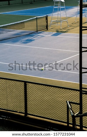 tennis ball in tennis court , sport background concept . vertical picture . 