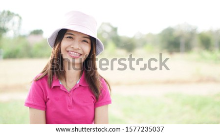 Asian woman tourists smile happily.                