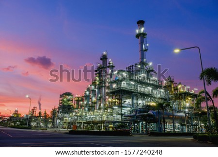 Industrial furnace and heat exchanger cracking hydrocarbons in petroleum factory on sky sunset background, Manufacturing of petrochemical plant Royalty-Free Stock Photo #1577240248