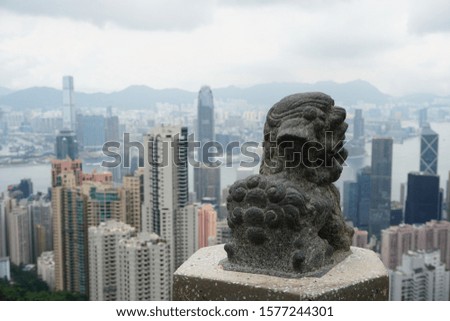 hong kong skyline with a goblin