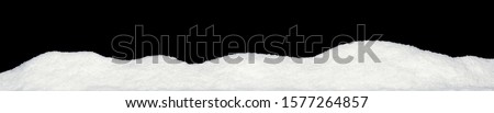 Banner of sparkling fuffy white snow hills isolated on black Royalty-Free Stock Photo #1577264857