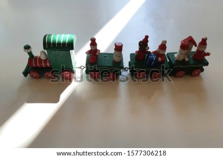 the lovely Christmas and Elf toy train decoration on the table