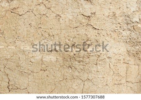 Old damaged wall with cracks and stains for a natural background.