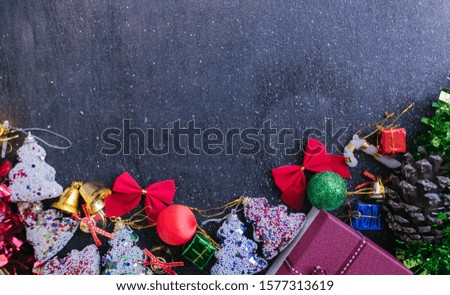 Christmas fir tree with decoration on wooden board. Christmas background.
