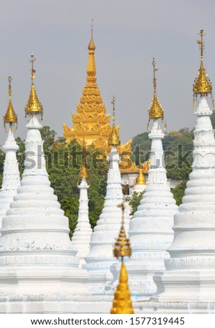 Myanmar. Mandalay. The Kutodo Pagoda is considered the world's largest stone book. Each stupa has one marble page of scripture.