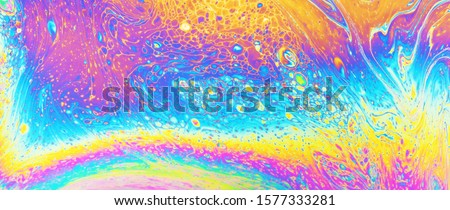 Colorful oil slick art abstract background backdrop rainbow photo texture design Royalty-Free Stock Photo #1577333281