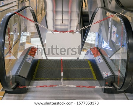 Broken escalator repair escalators no entrance closed passageway, white sign for your lettering and advertising. isolate, copy space