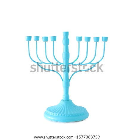 religion image of jewish holiday Hanukkah with blue menorah (traditional candelabra) isolated over white background