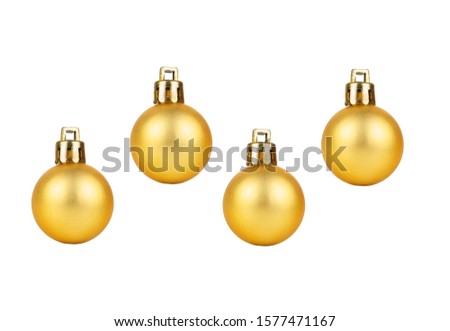 Four golden Christmas balls isolated on white background