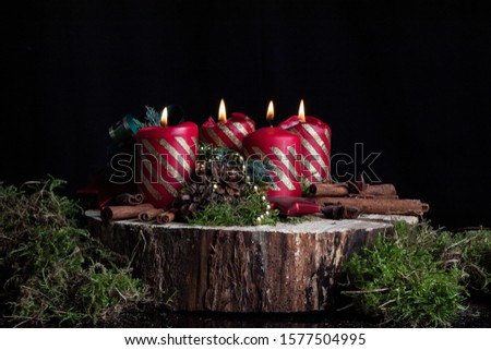 Advent candles on a black background