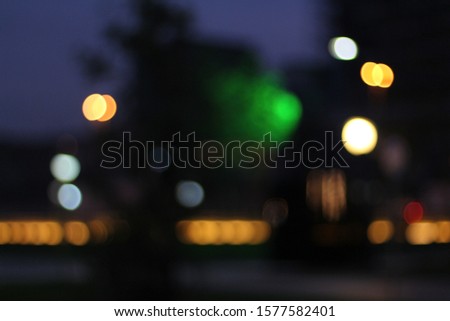Bokeh of the night lights of the city. Blurred backgroud for designers. Free space for text and logo.