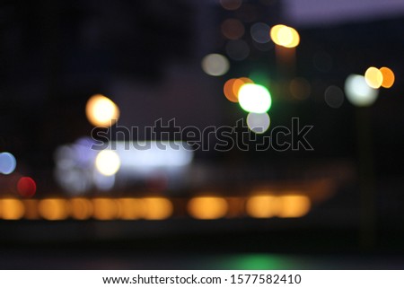 Bokeh of the night lights of the city. Blurred backgroud for designers. Free space for text and logo.