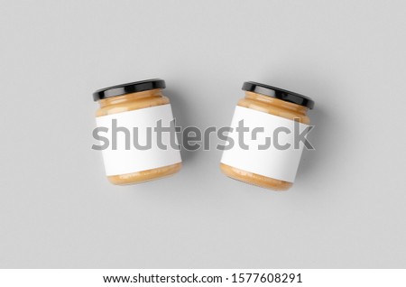 Peanut, almond, nut butter jar mockup with blank label.