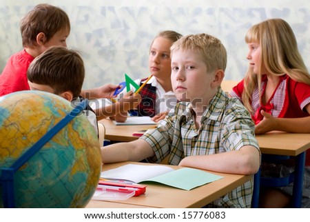 Pupils at classroom at school.
