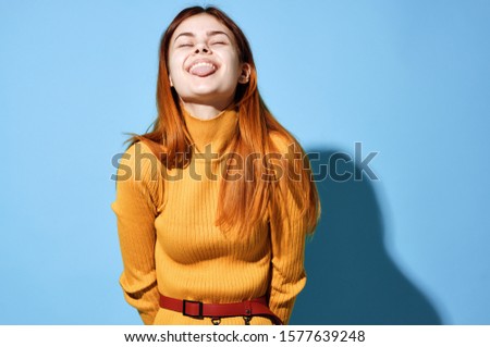 Cheerful woman blue background smile charm model