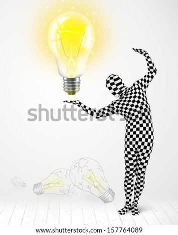 Funny man in full body suit with glowing light bulb, new idea concept