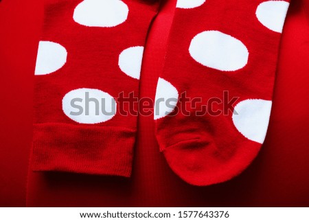 Red socks is on the red background pattern dot for Christmas day