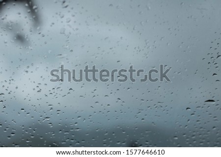 Water droplets on the glass during the rainy season