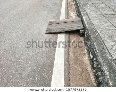 wooden slope footpath car parking