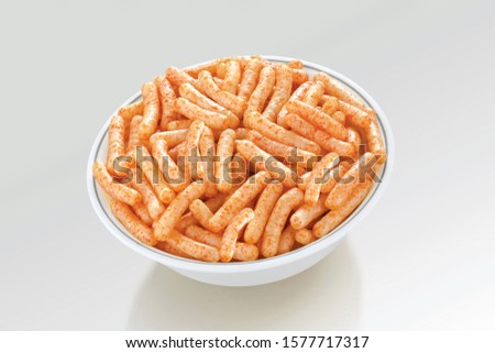 Fried and Spicy Stick, Sali Sev, noodles, Snacks or Fryums (Snacks Pellets) White background. selective focus - Image Royalty-Free Stock Photo #1577717317