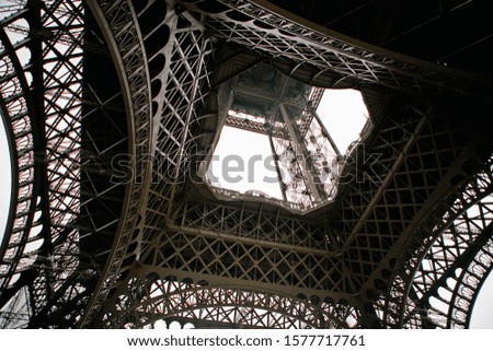 The iron construction of the Eiffel Tower. View from below. Paris.