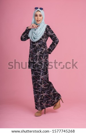 Fashion Portrait Of Young Beautiful Muslim Woman Wearing