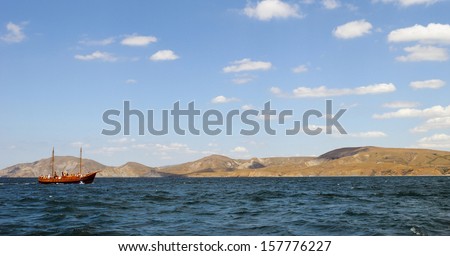 Beautiful landscape with sailboat at sea in Crimea, Ukraine 
