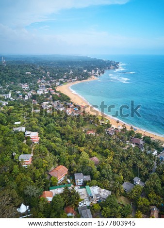 Aerial view of Unawatuna Beach and city in Sri Lanka