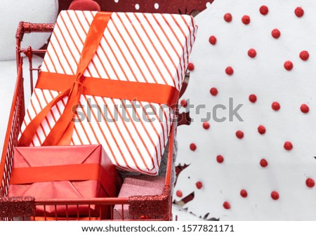 gift box red ribbon bow shopping mall sale on Christmas eve winter holidays time wallpaper pattern advertising picture 
