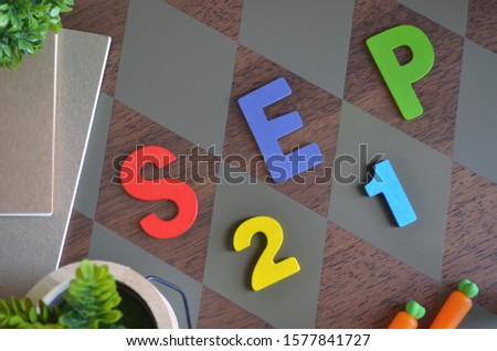 September 21, Appointment with wooden text design for background.