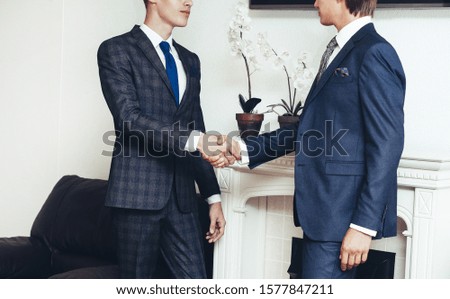 handshake business people in the meeting room .